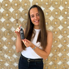 healing serum person holding the product